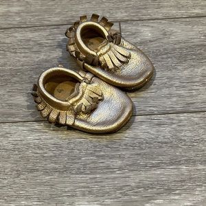 Gold fringe baby moccasins